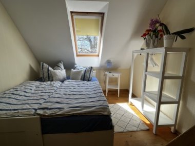 Kinderzimmer mit Doppelbett im Ferienhaus Fischersteig